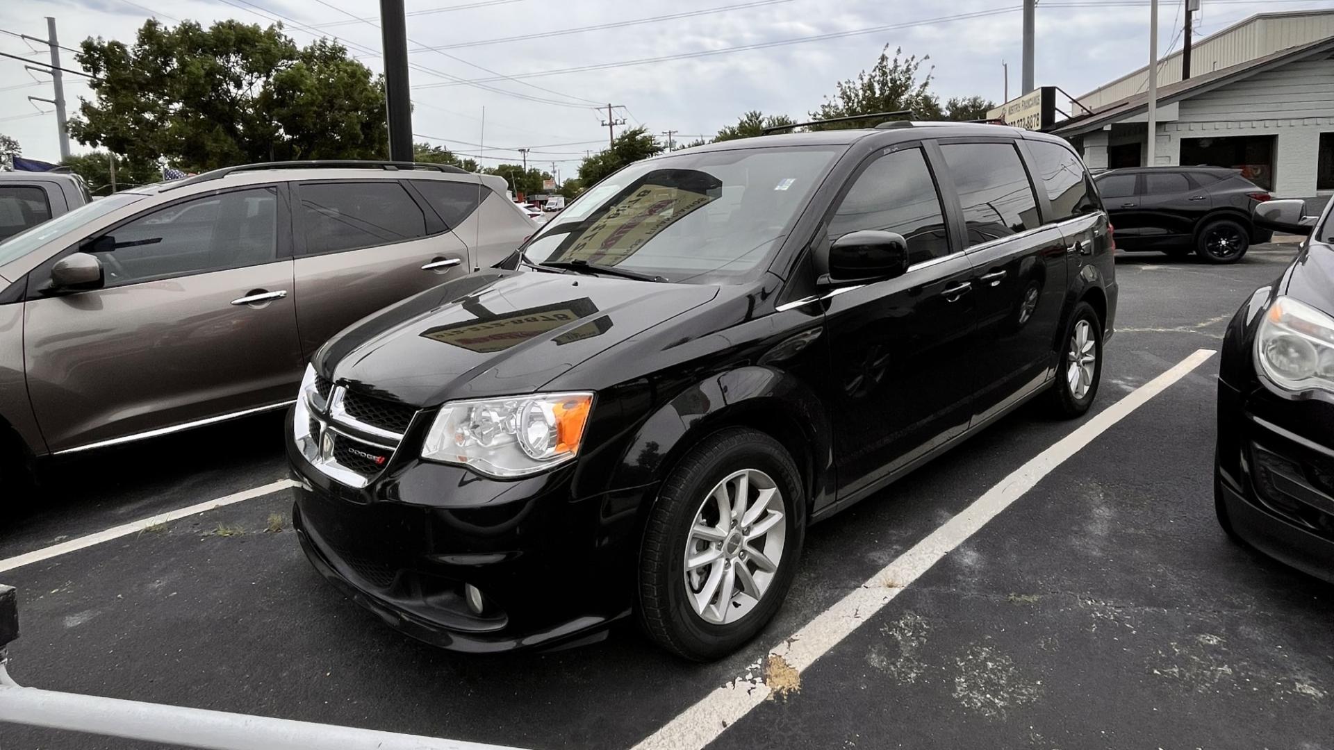 2018 Black Dodge Grand Caravan (2C4RDGCG9JR) , located at 945 E. Jefferson Blvd, Dallas, TX, 75203, (214) 943-7777, 32.752514, -96.811630 - Photo#0